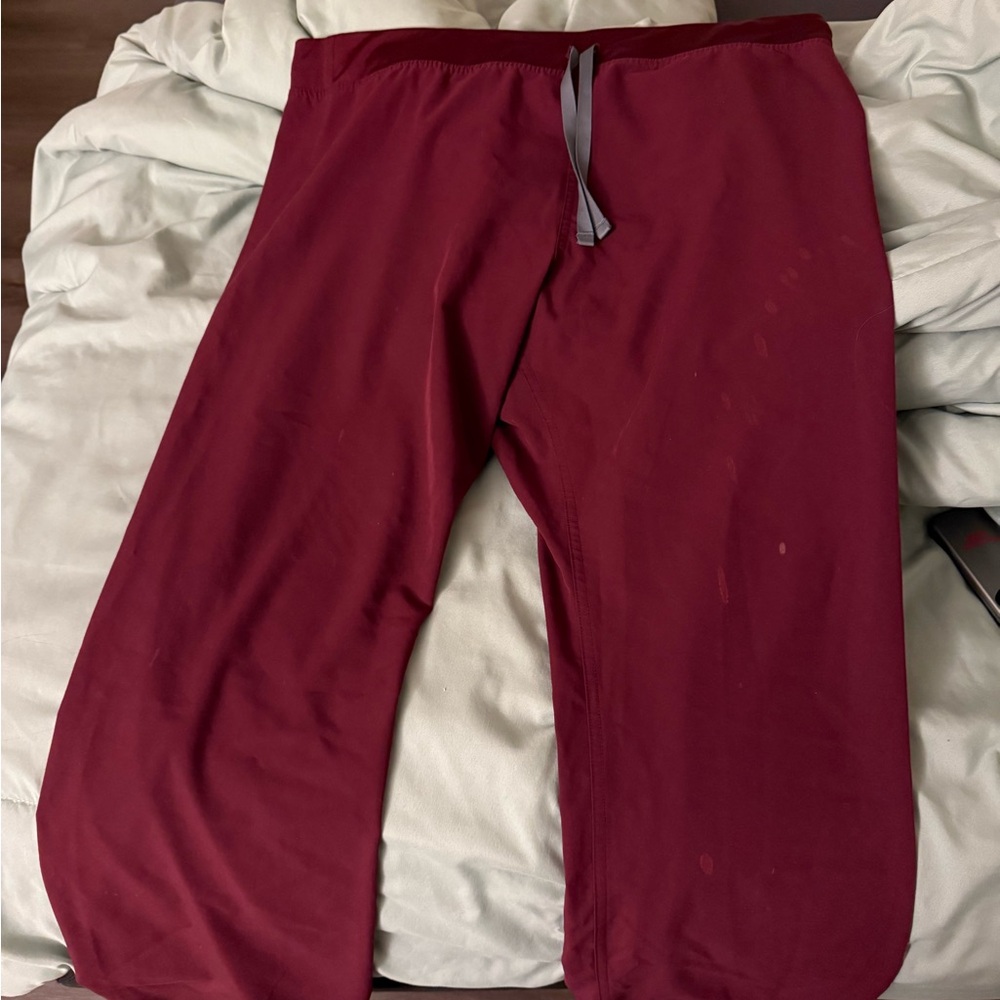 Maroon figs pants. Some bleach stains, size xl.